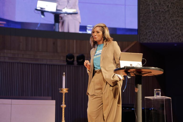Kaye Monk-Morgan speaking to a crowd at the Leadership Institute.